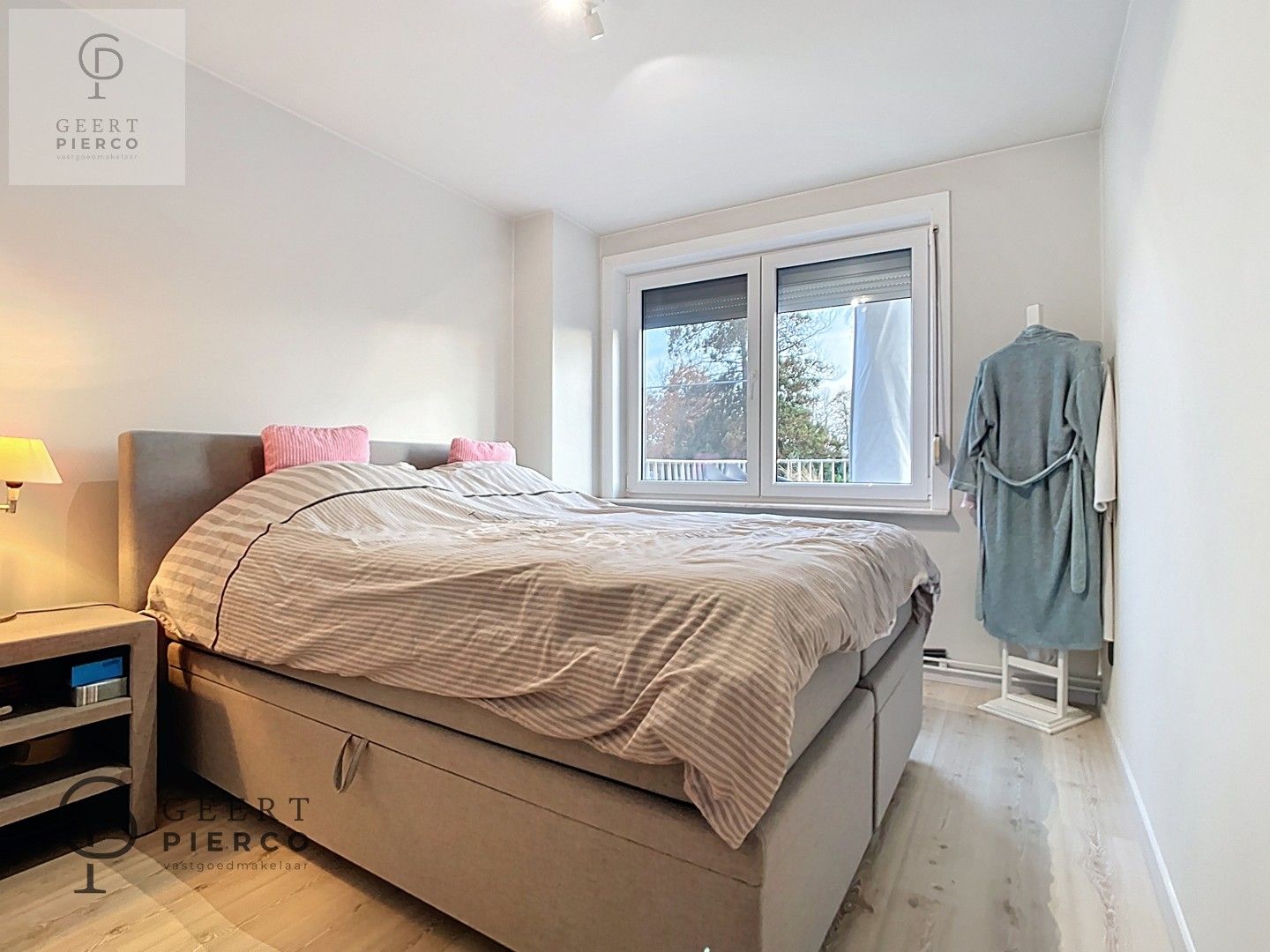 Gerenoveerd appartement met twee slaapkamers, ruim terras en ondergrondse staanplaats aan de stadsrand van Tienen. foto 12