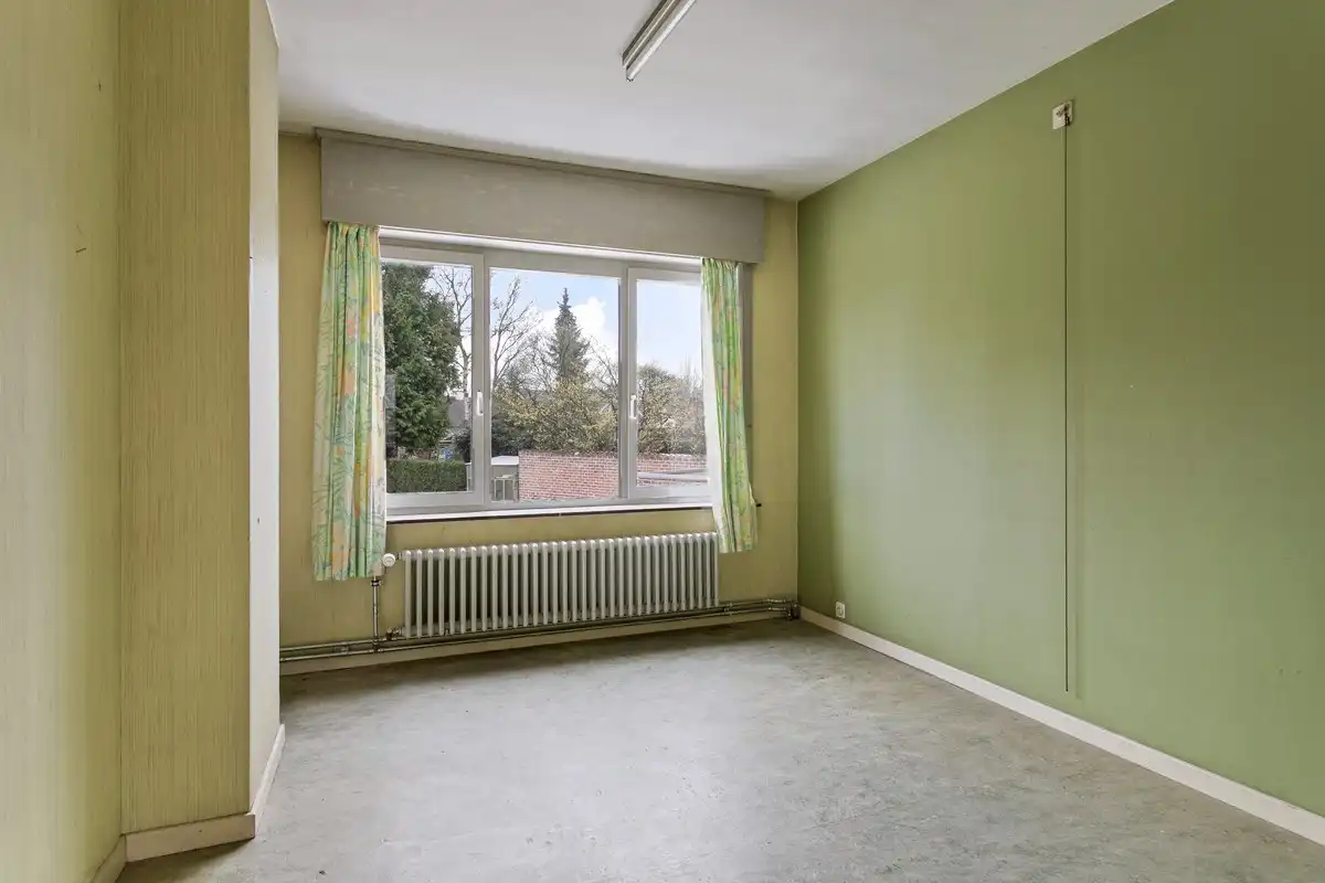 Ruime woning met 4 slaapkamers en garage! foto 16