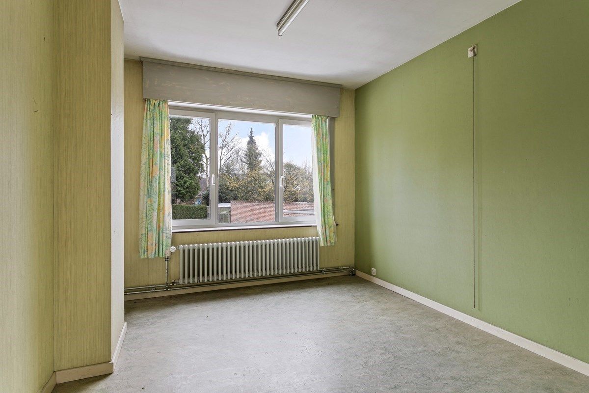 Ruime woning met 4 slaapkamers en garage! foto 16