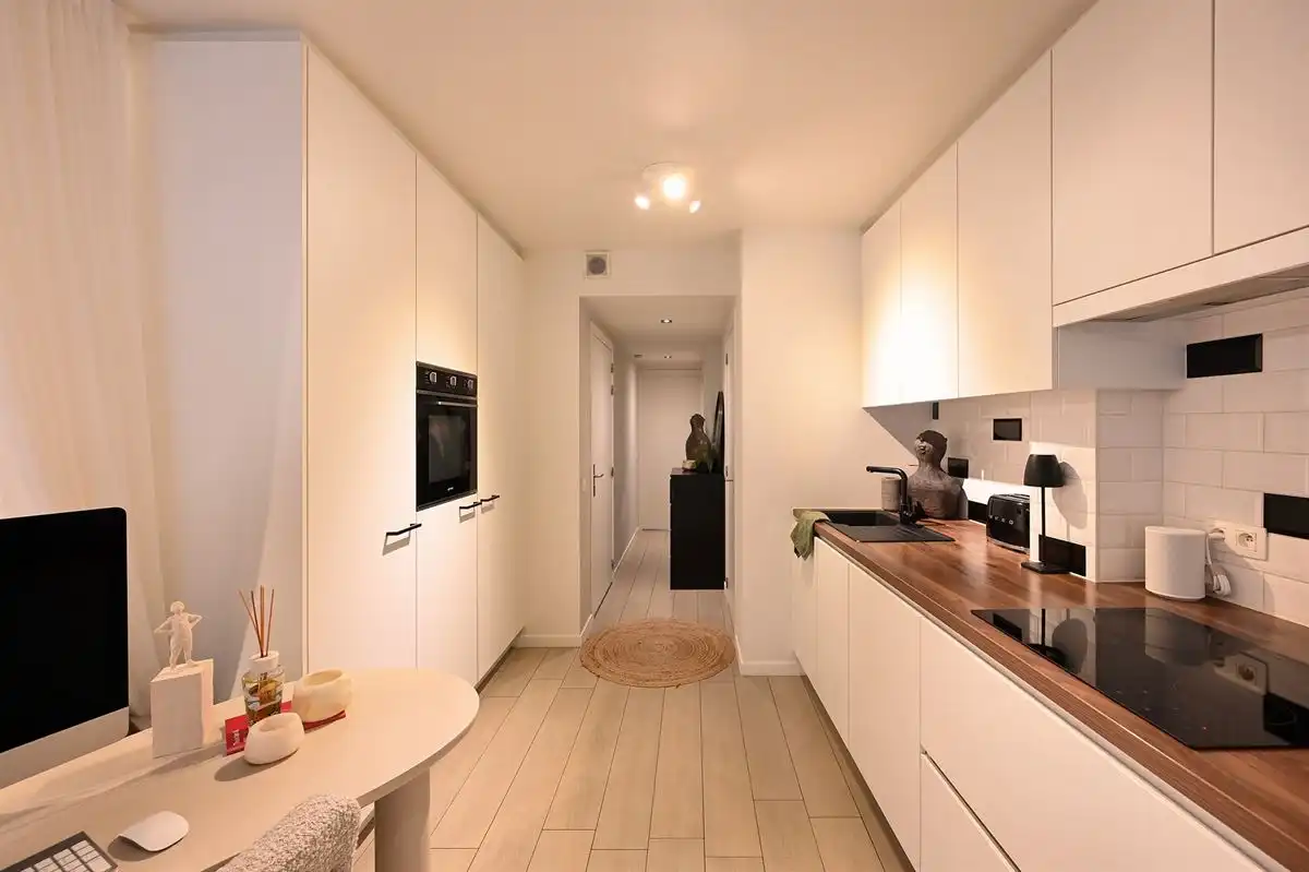 Instapklaar gelijkvloersappartement met heerlijke stadstuin foto 8
