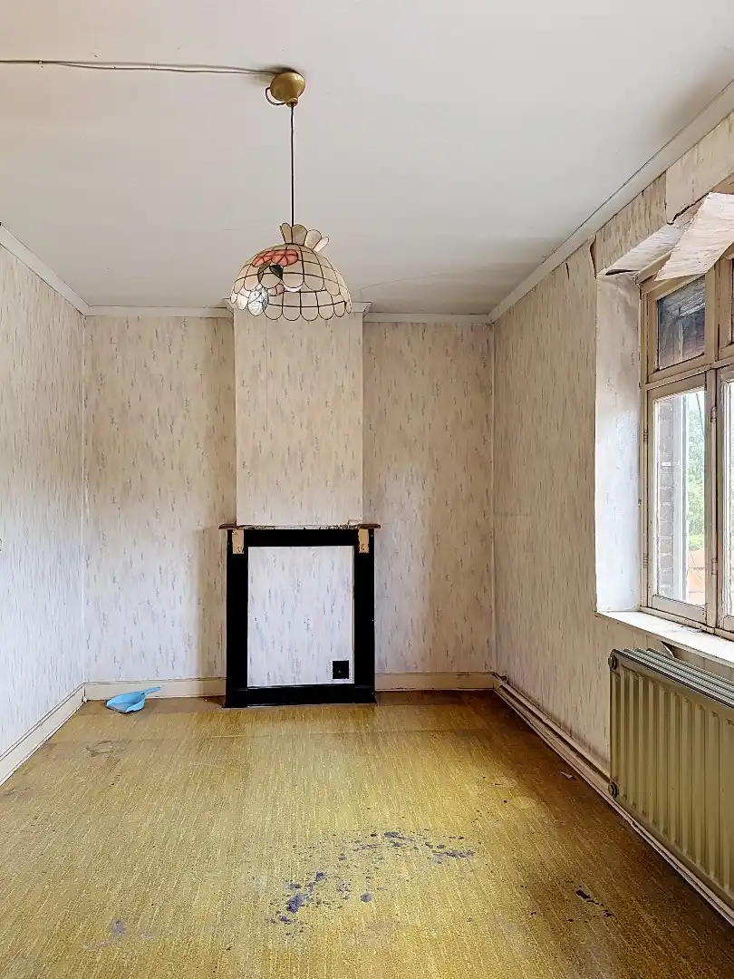 Te renoveren gezinswoning met ruime tuin in Tienen foto 11