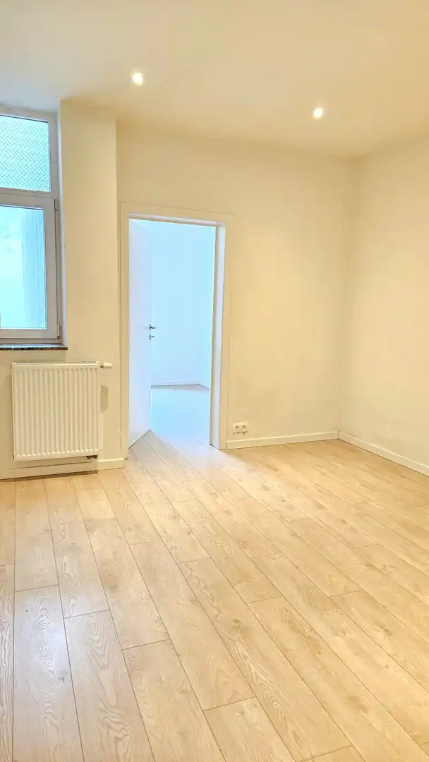Appartement op het gelijkvloers met koer foto 9