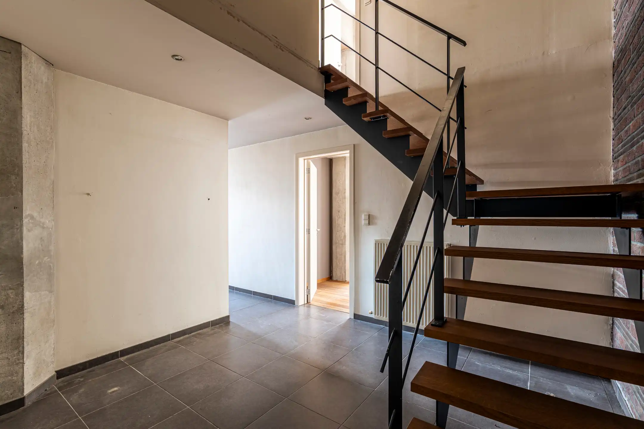 Duplex in loftstijl inclusief ondergrondse parking op de Grote Markt foto 15