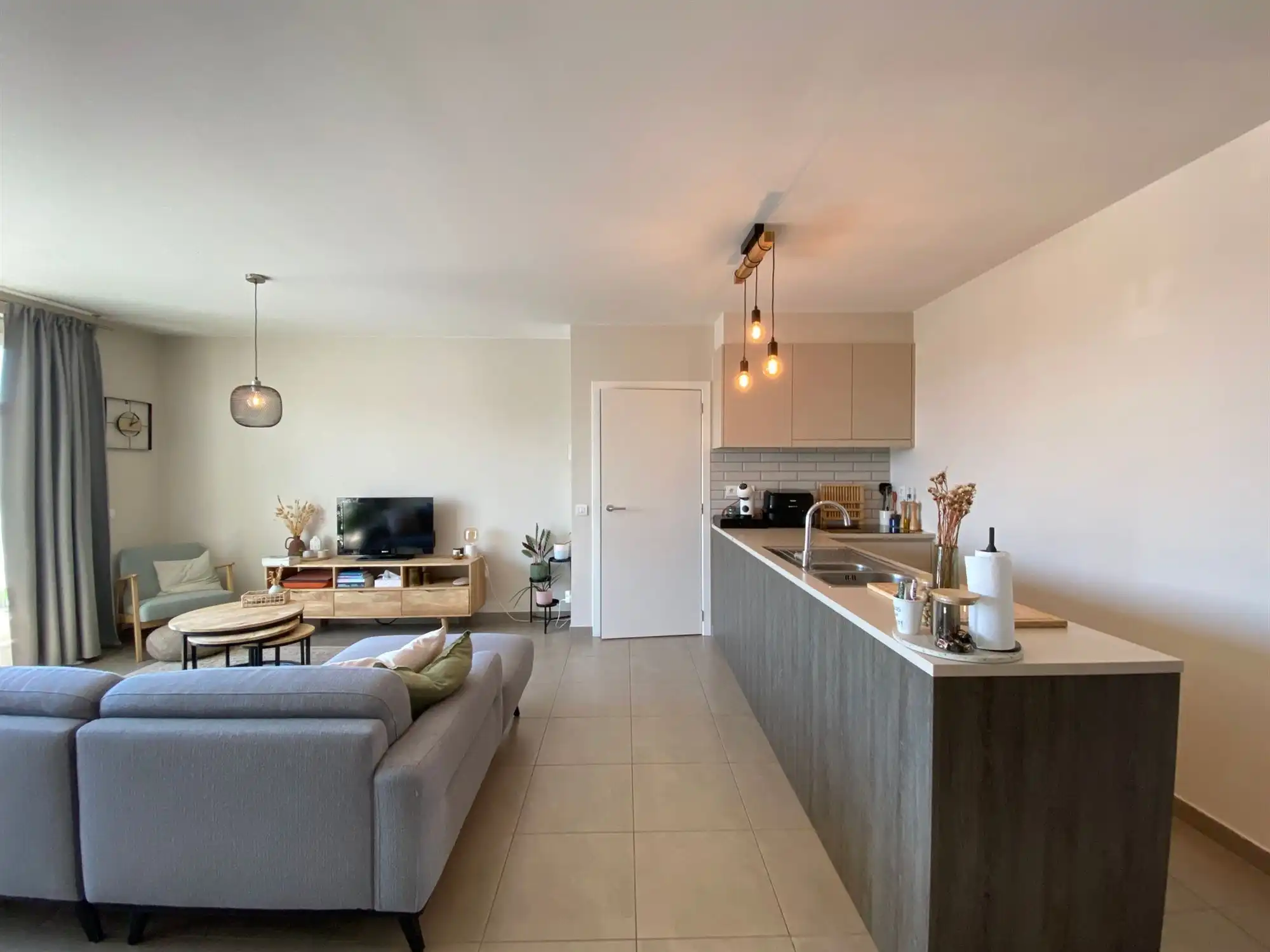 Prachtig energiezuinig dakappartement met 2 slaapkamers, ruim zonovergoten terras en garage in hartje Ertvelde foto 4