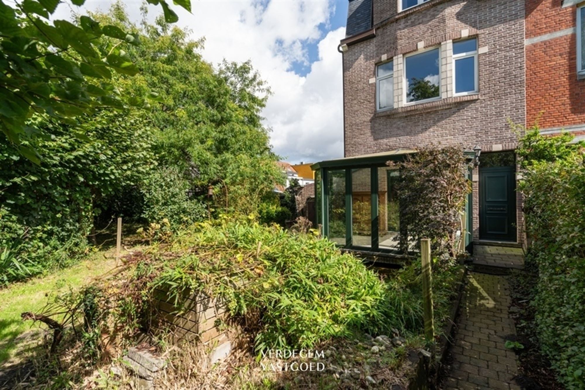 Uniek wonen in weelderige tuin langs verborgen paadje foto 20