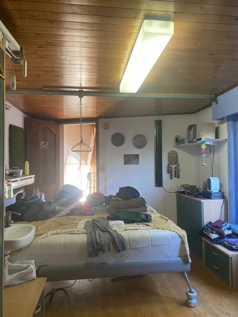 Centraal gelegen te renoveren woning met ruime garage en achterliggende tuin foto 9