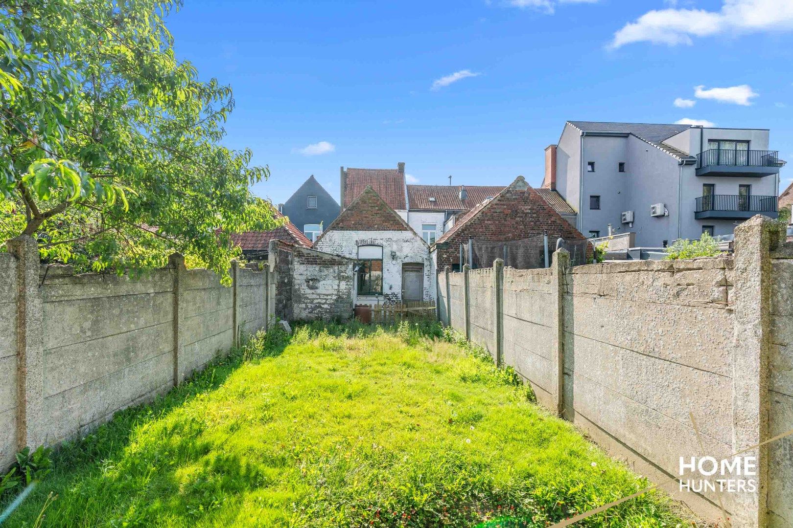 Verrassend ruime, te renoveren rijwoning met tuin  foto 10