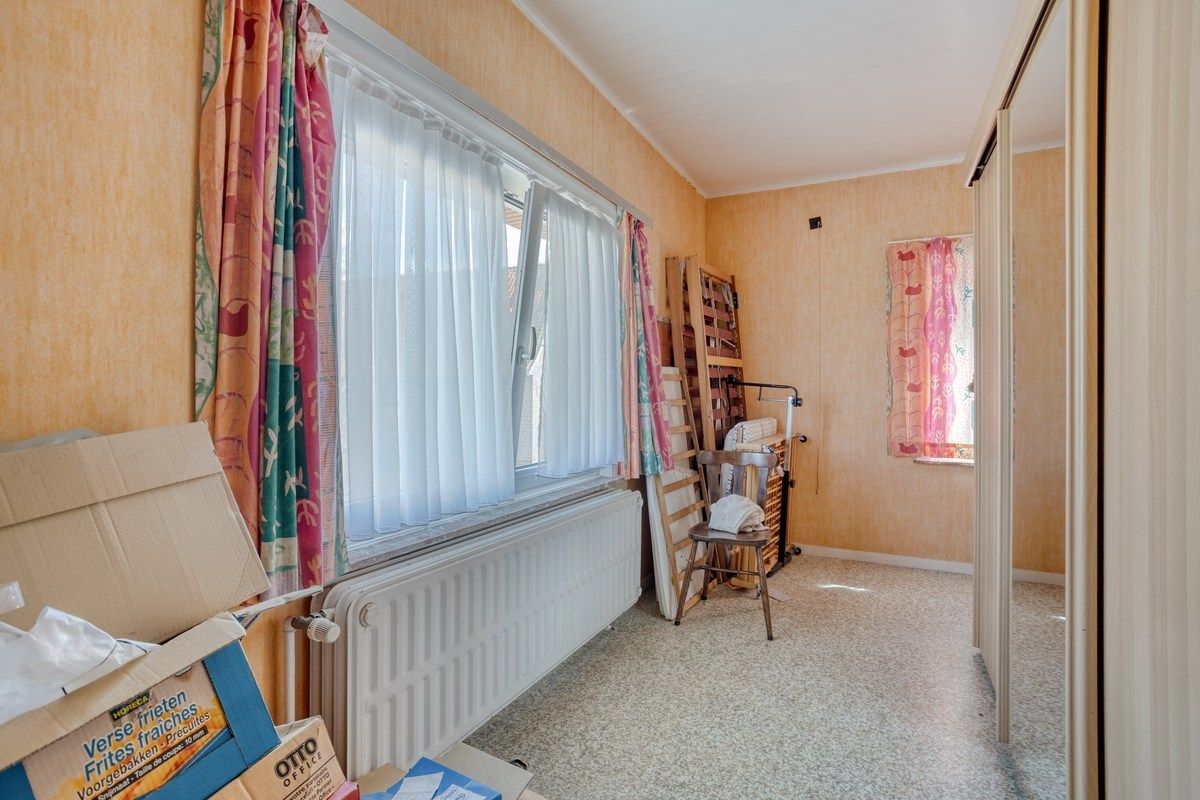 Te renoveren woning en 2 bouwgronden foto 9