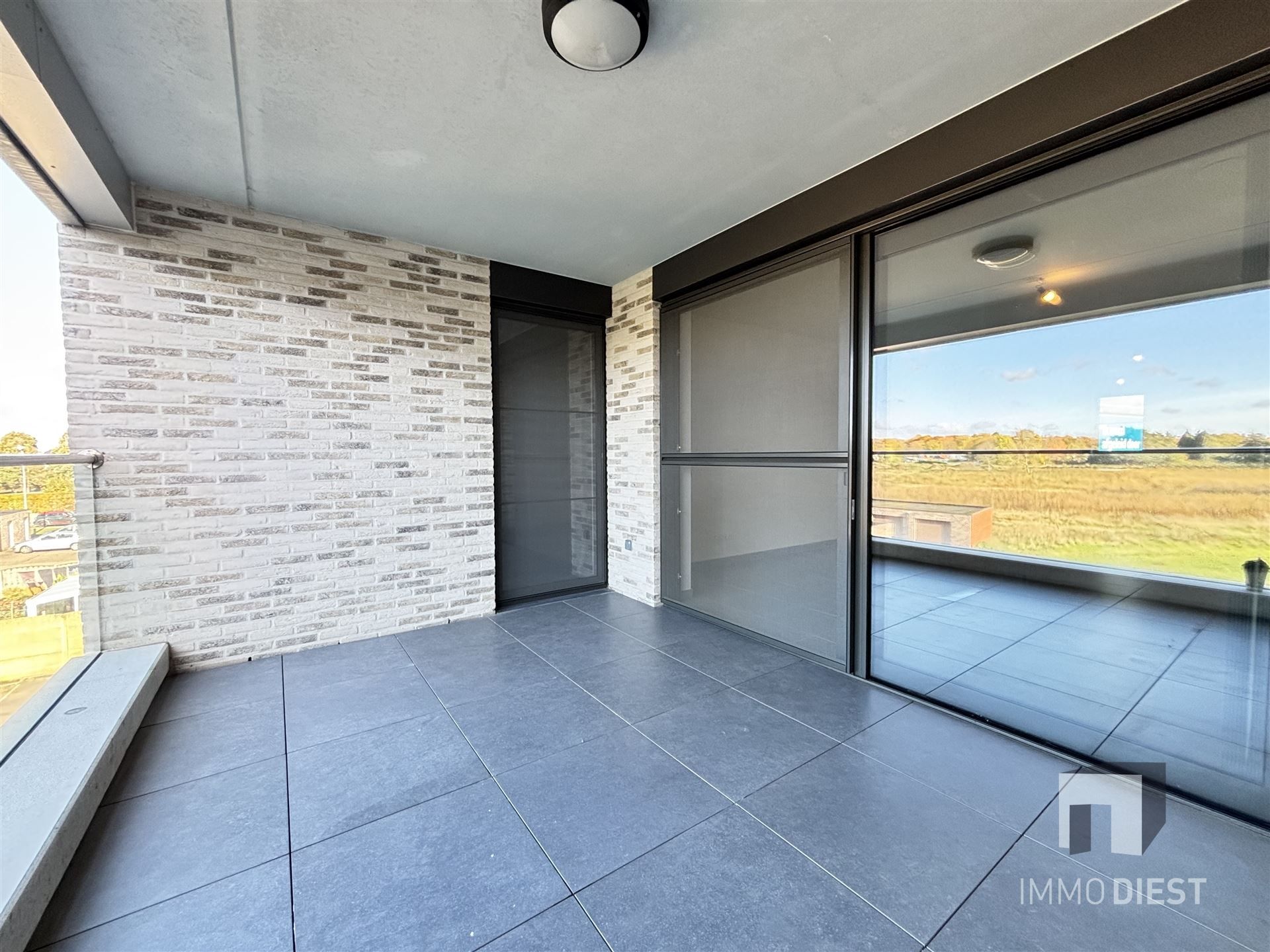 Ruim appartement op de tweede verdieping in het centrum van Tessenderlo foto 18