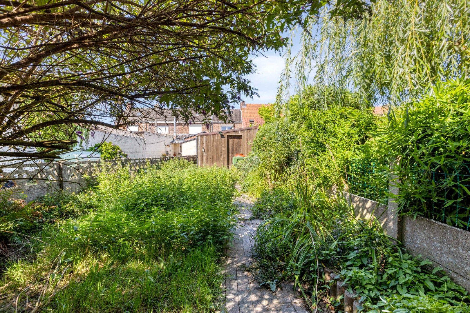 Gezellig ingerichte woning met hobbyruimte en tuin + toegang achterom foto 27