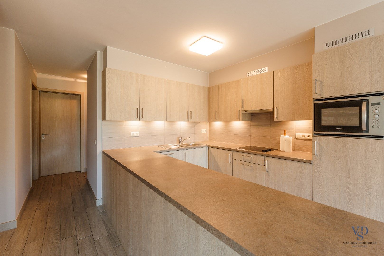 Gelijkvloers 2 slpk-appartement met terras foto 12