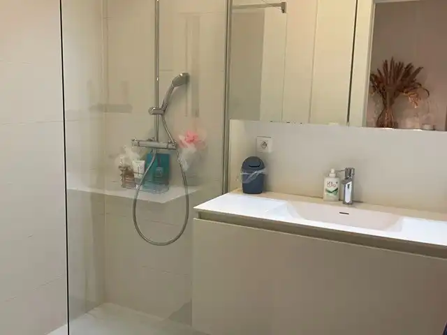 Centraal gelegen instapklaar en energiezuinig appartement met parking foto 12