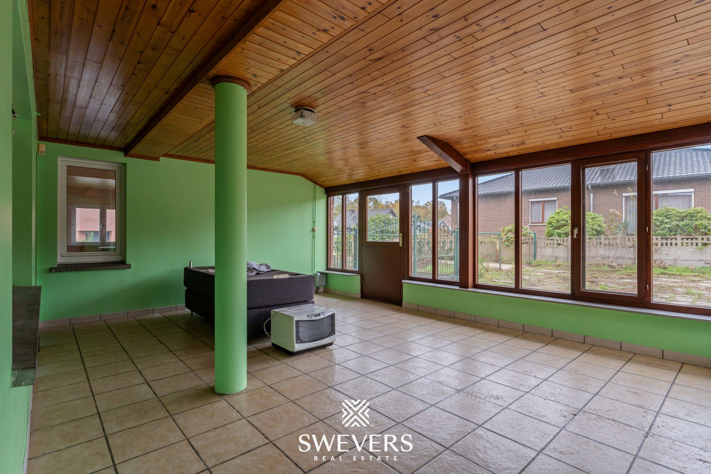 Ruime open bebouwing met potentieel en zuidgerichte tuin in rustige wijk van Houthalen foto 6