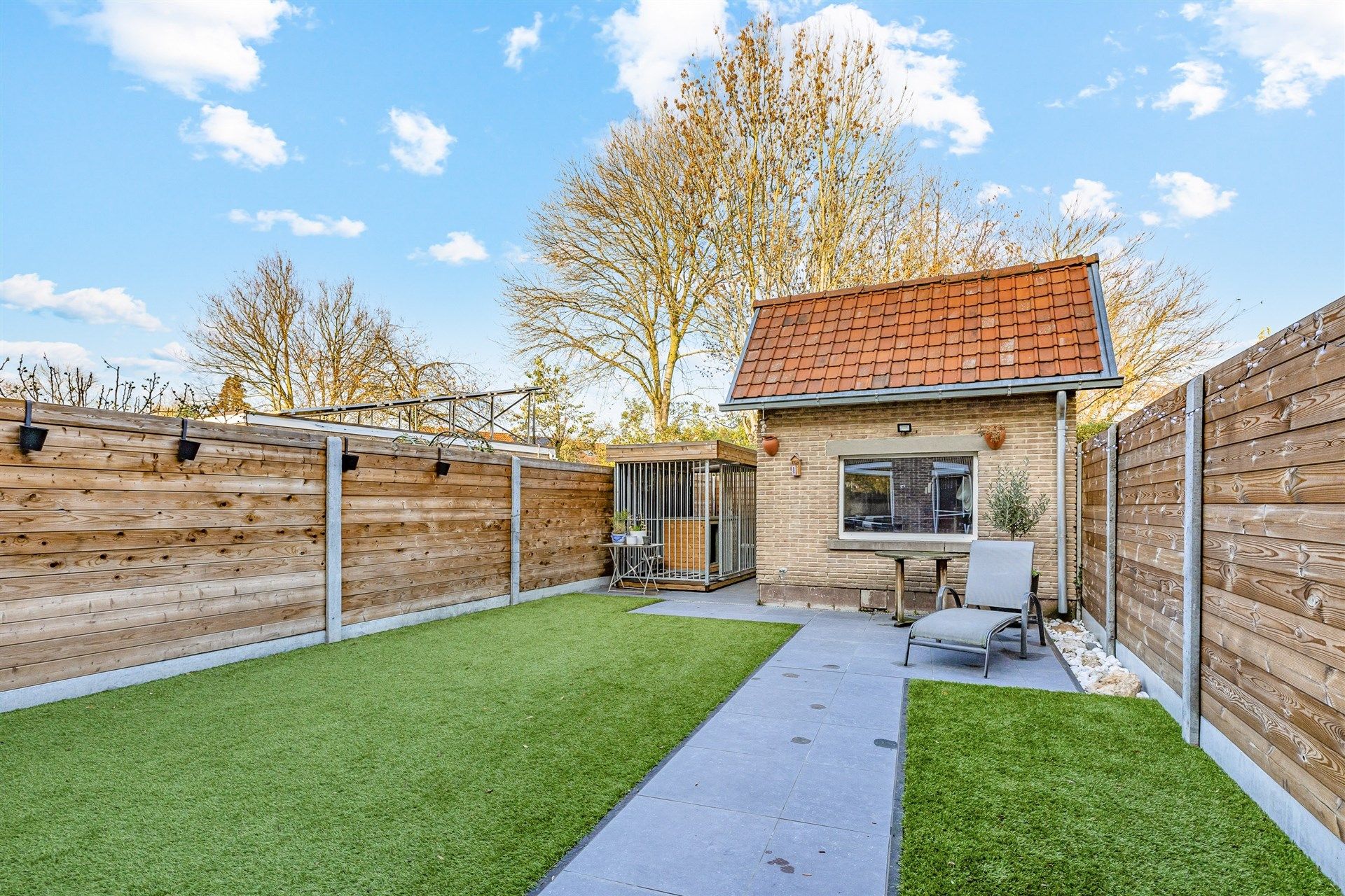 Instapklare woning met 2 slks, tuin en achteruitweg foto 19