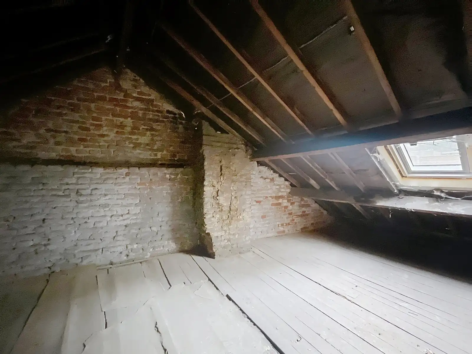 Handelspand met woongelegenheid op de Markt van Tienen foto 11