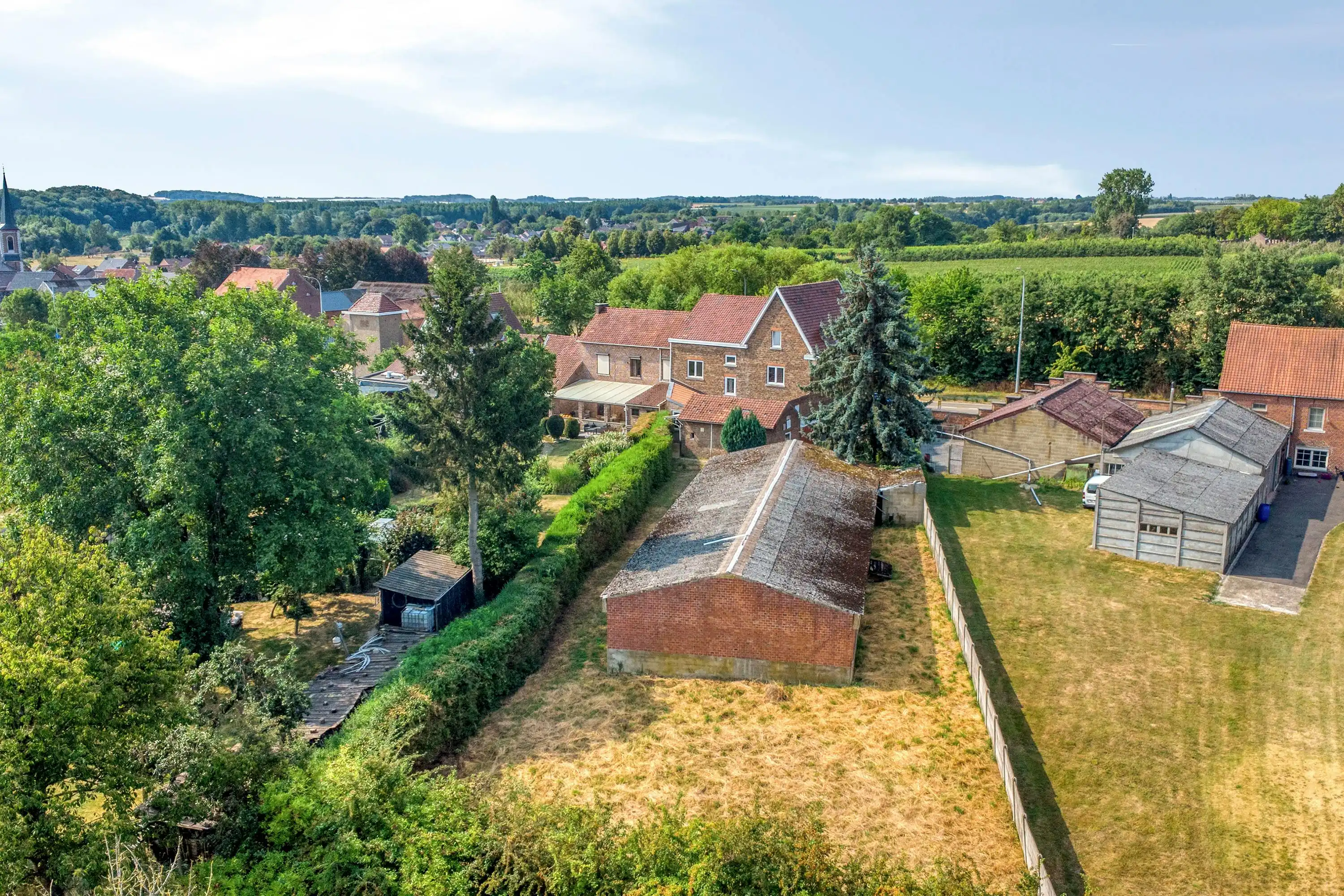 Huis met 5 slaapkamers en loods te koop in Sint-Truiden foto 4