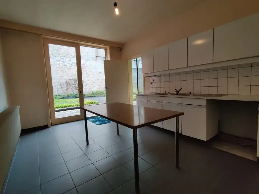 Moorslede – Ruim pand met potentieel voor een appartement met tuin foto 8