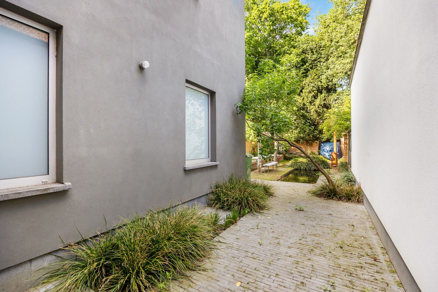 Eclectische herenhuis van ±325m² met mogelijks 5 slaapkamers en een tuin van liefst ±115m² te Zurenborg! foto 11