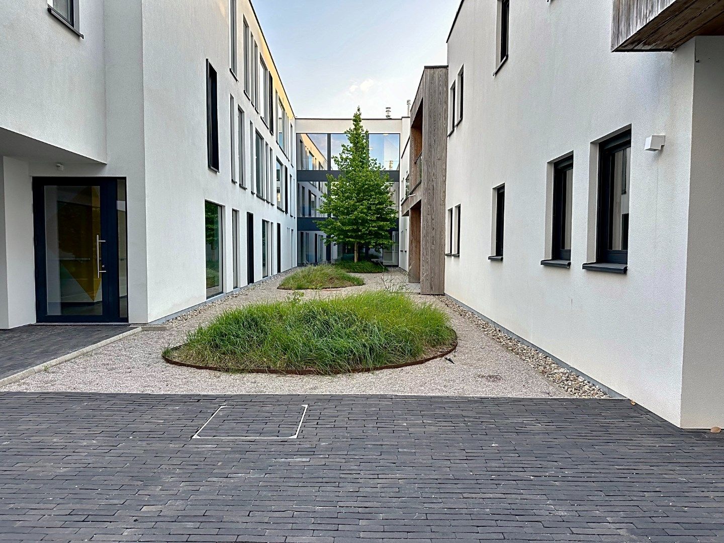 Stijlvol gelijkvloers appartement met gemeenschappelijke tuin foto 10