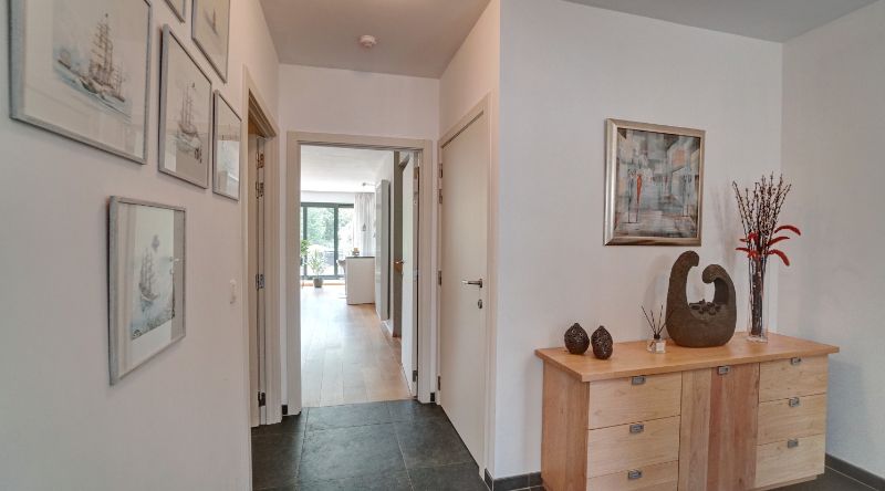 Luxe appartement 150m² met 2 ruime terrassen en autostaanplaats + kelder foto 4