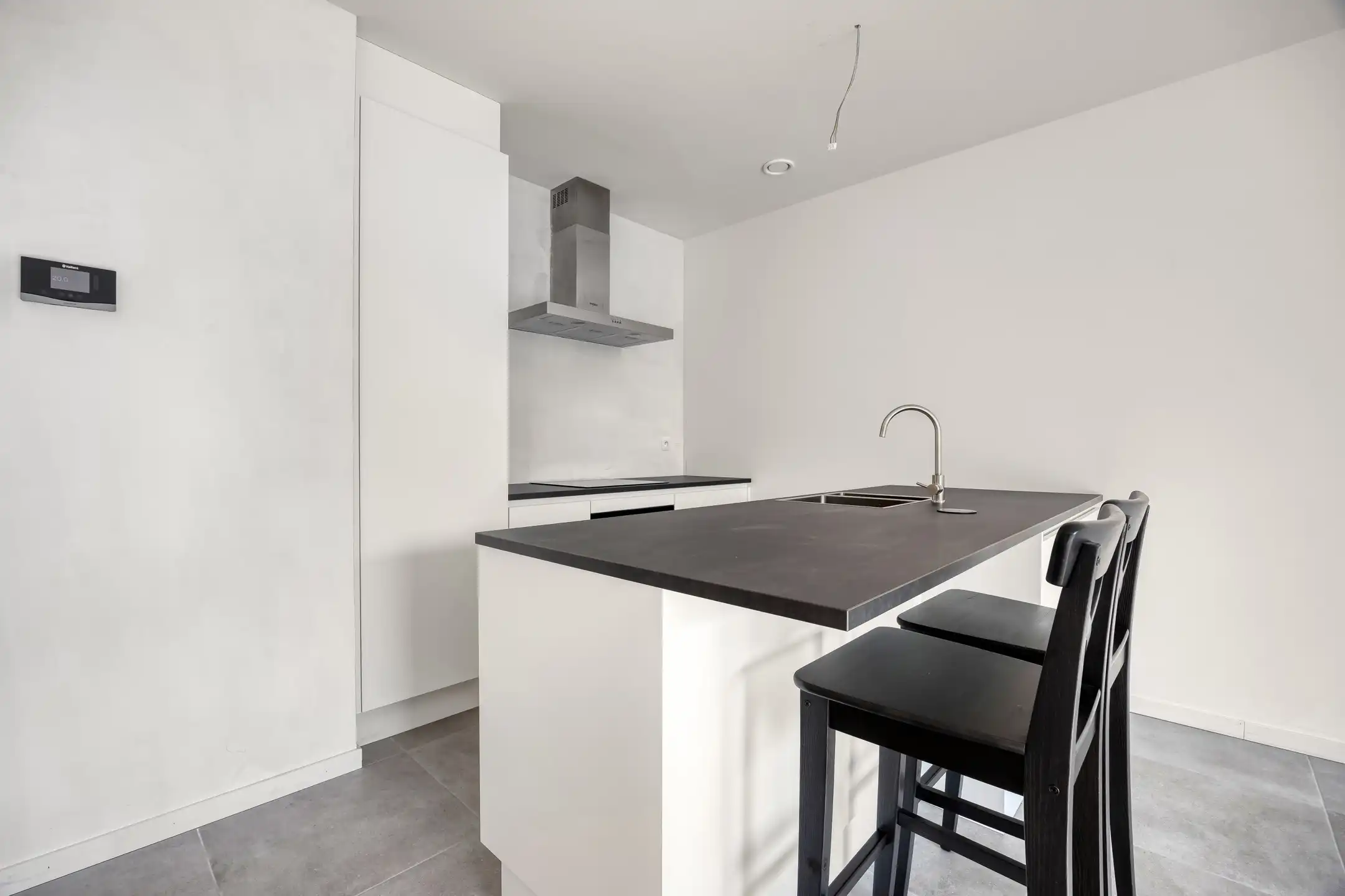Stijlvol gelijkvloers appartement met tuin foto 4