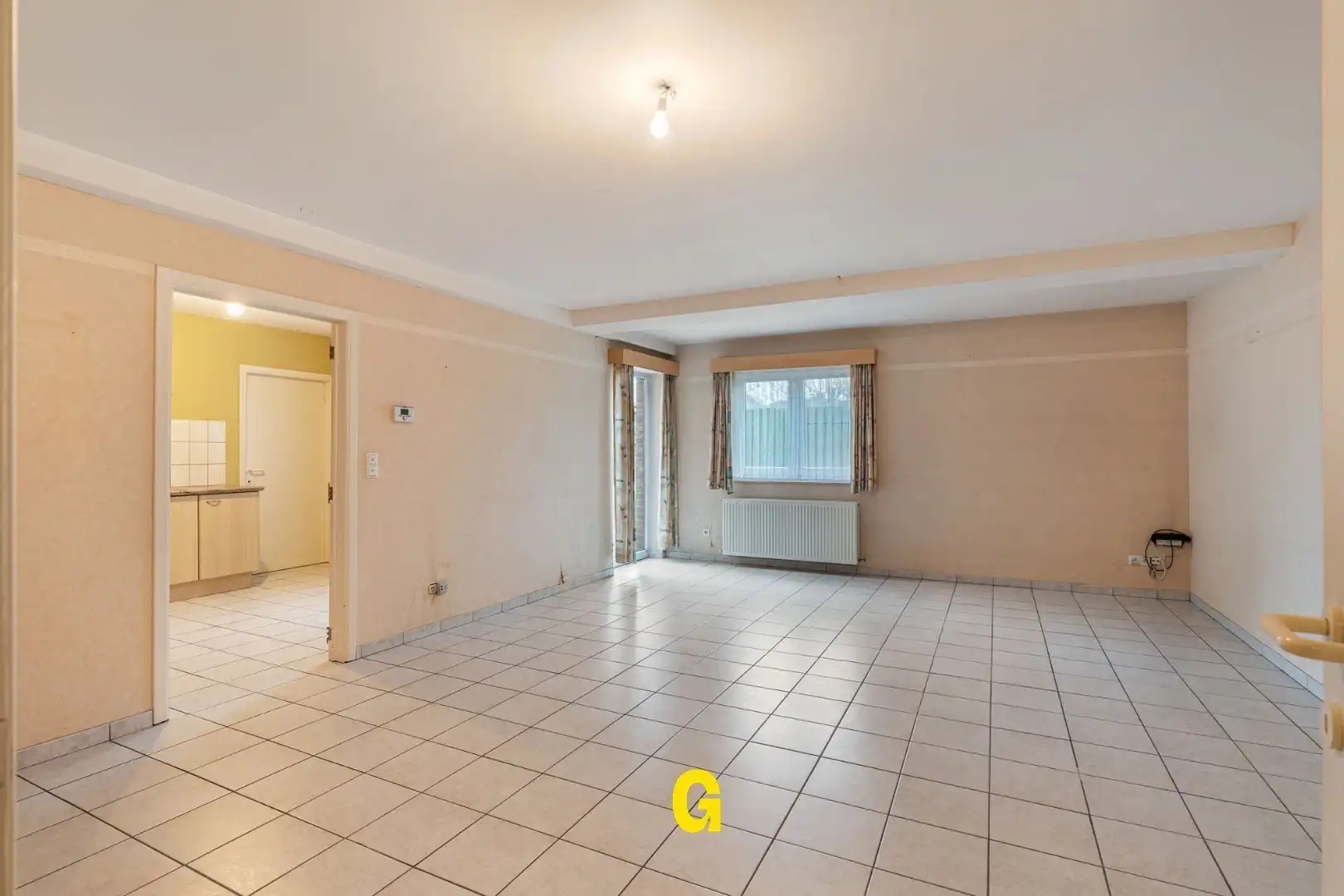 Degelijk (rolstoelvriendelijk) gelijkvoersappartement met terras uitgevend op de tuin, afsluitbare garage en berging foto 6