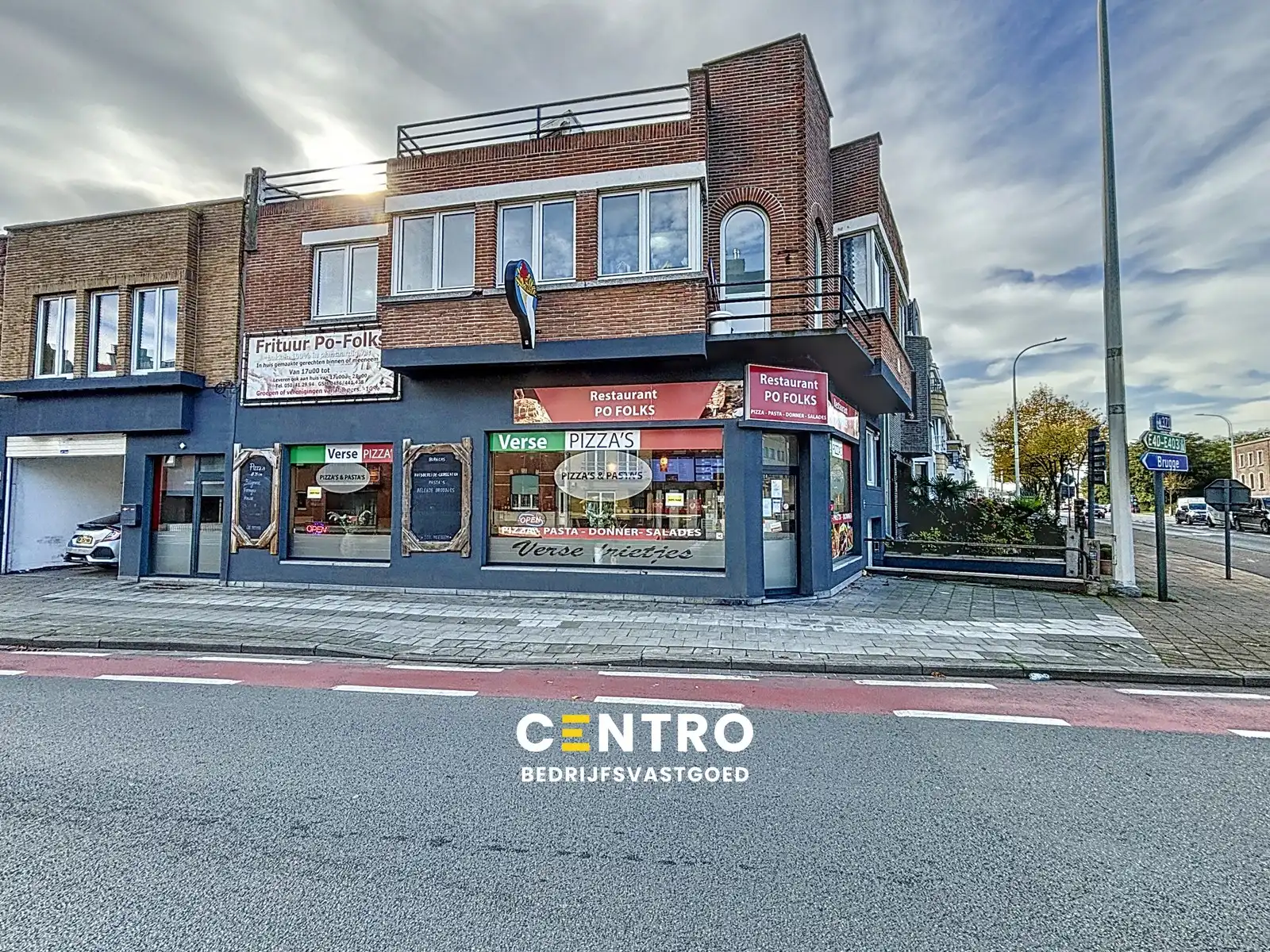 Woon- en handelshuis (handelszaak + 2 appartementen) met garage! foto {{pictureIndex}}