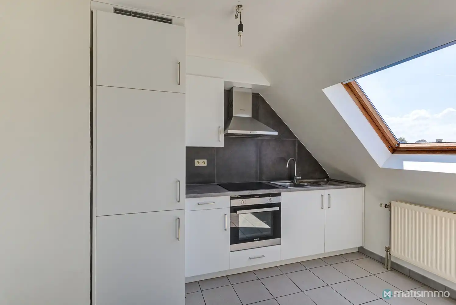 INSTAPKLAAR DUPLEX-APPARTEMENT MET 2 SLAAPKAMERS EN GARAGE NABIJ HET CENTRUM VAN BILZEN foto 5