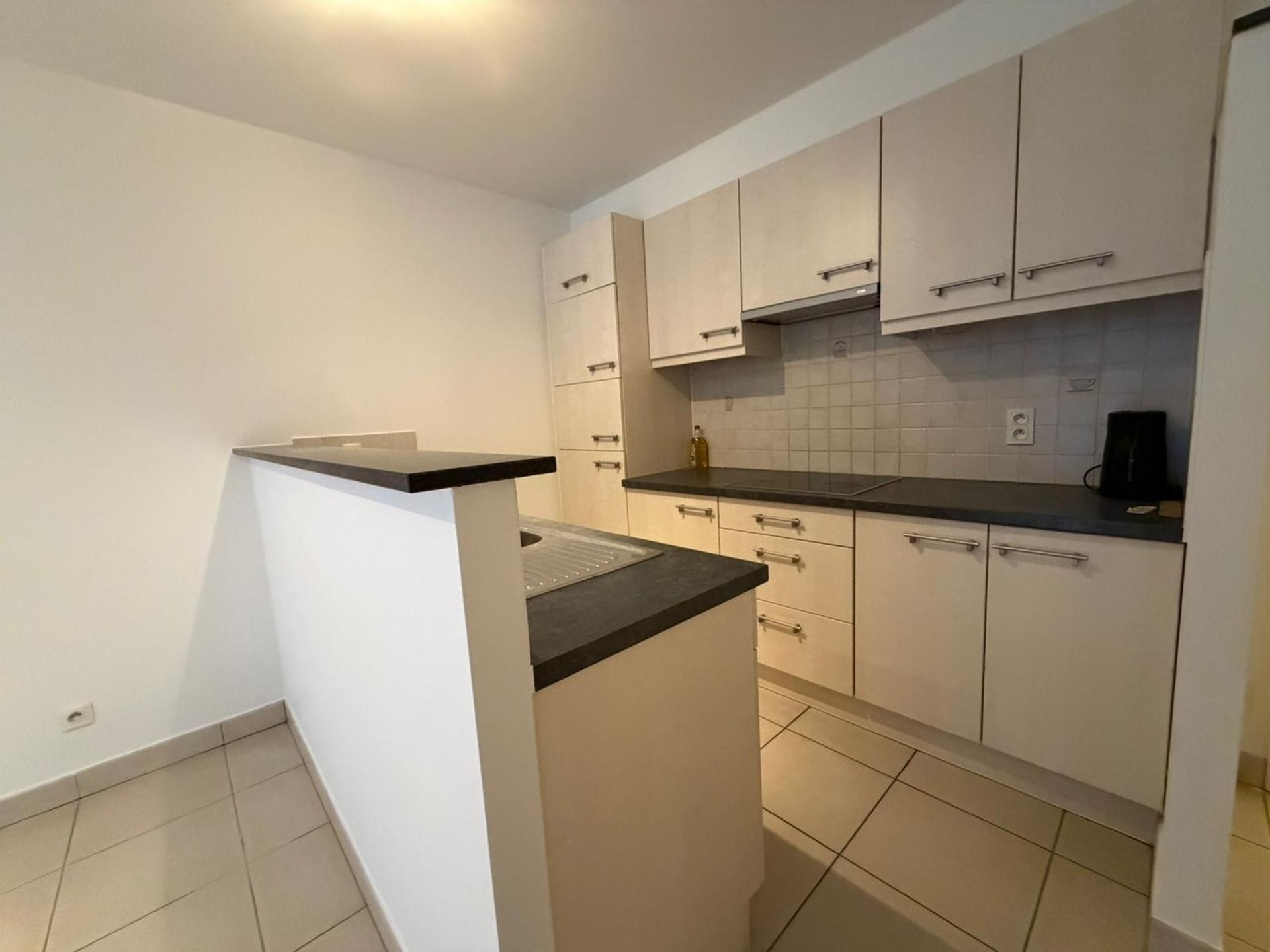 Duplex-appartement met extra zolderkamer + garagebox in het centrum! foto 4