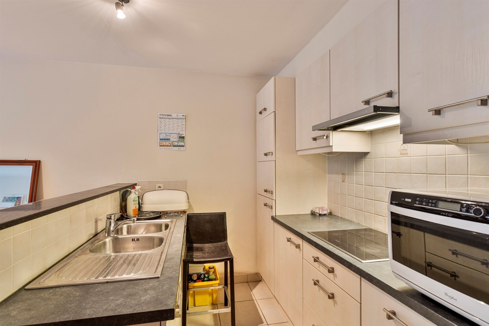 Duplex-appartement met extra zolderkamer + garagebox in het centrum! foto 4