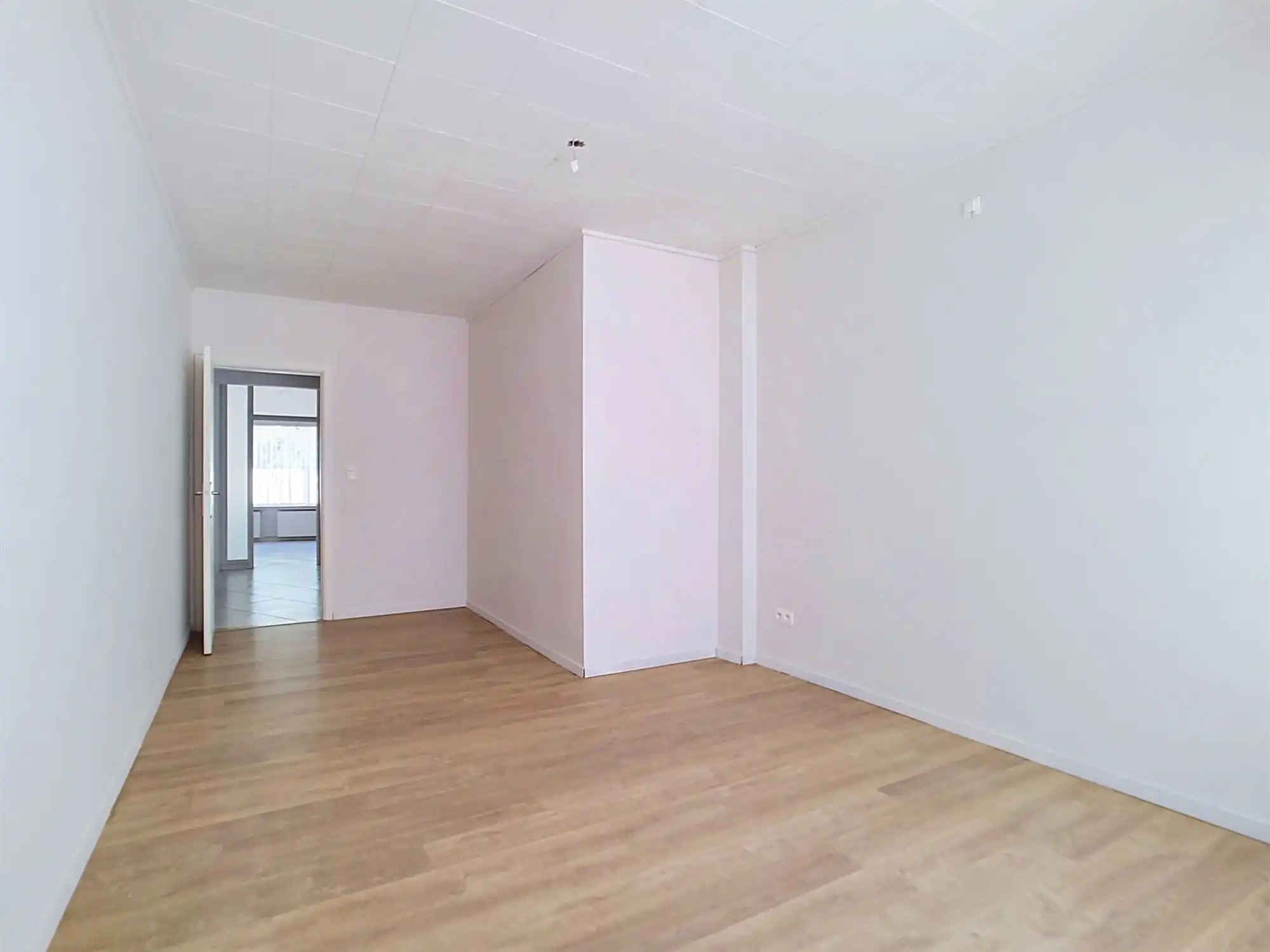 Gelijkvloers appartement met 2 slaapkamers, polyvalente ruimte en garage foto 10