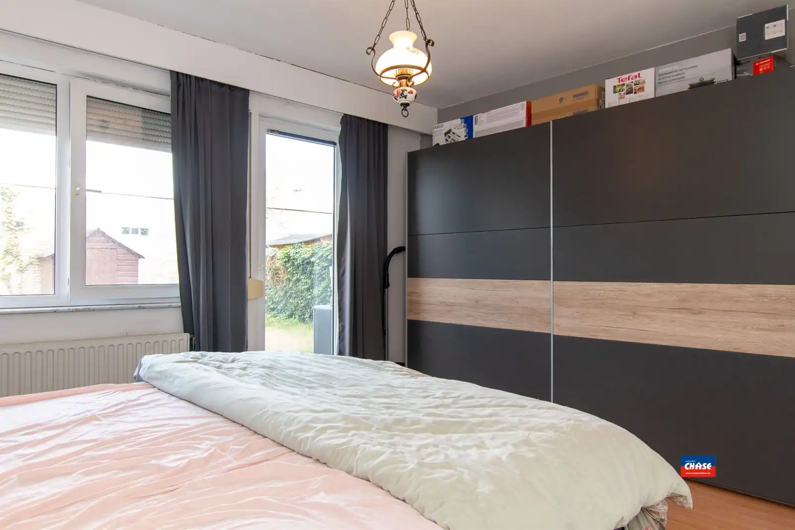 Gelijkvloersappartement met 2 slpks, tuin + garage foto 7