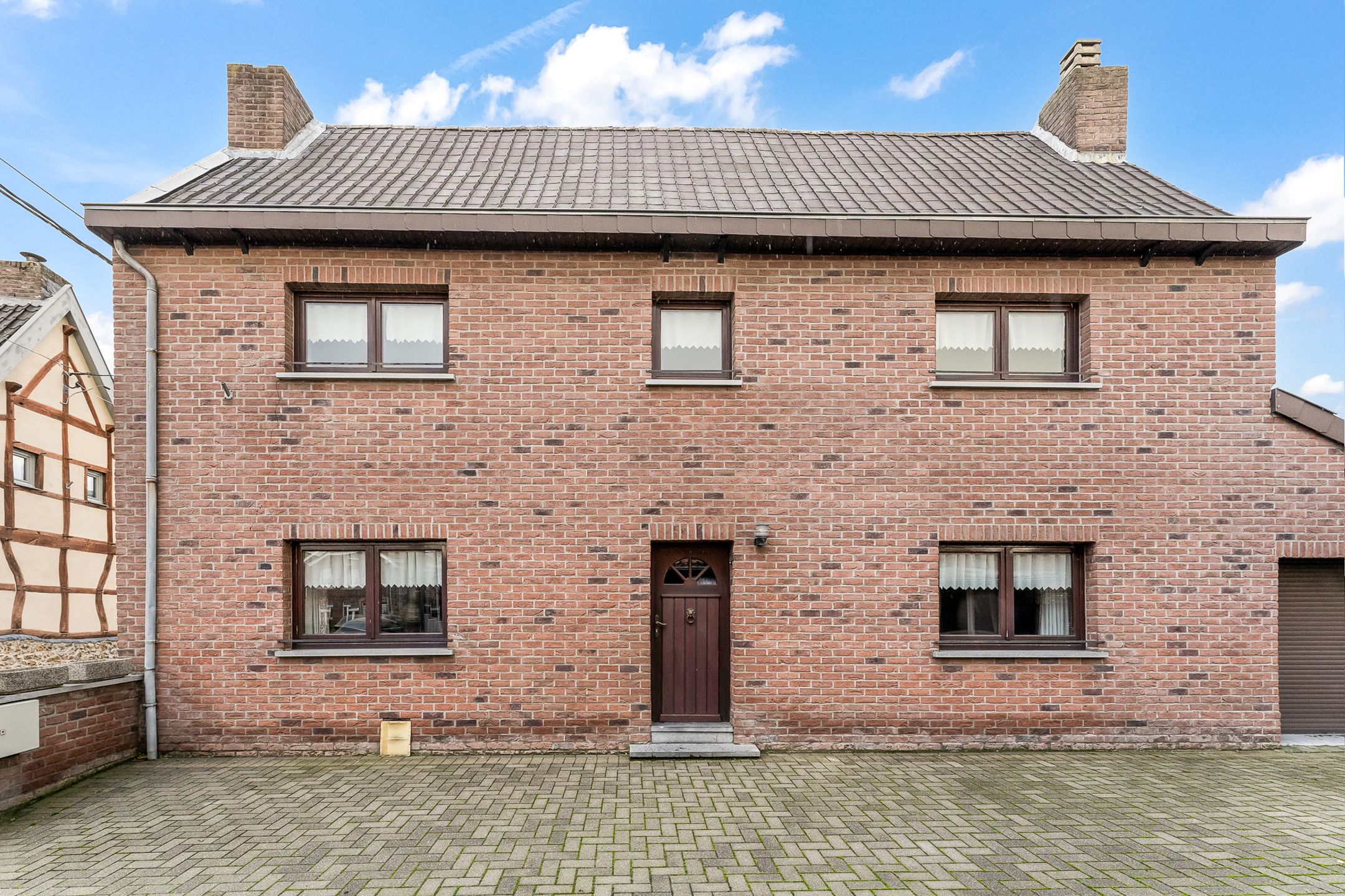 HOB gezinswoning + bijgebouw in de Voerstreek foto 2