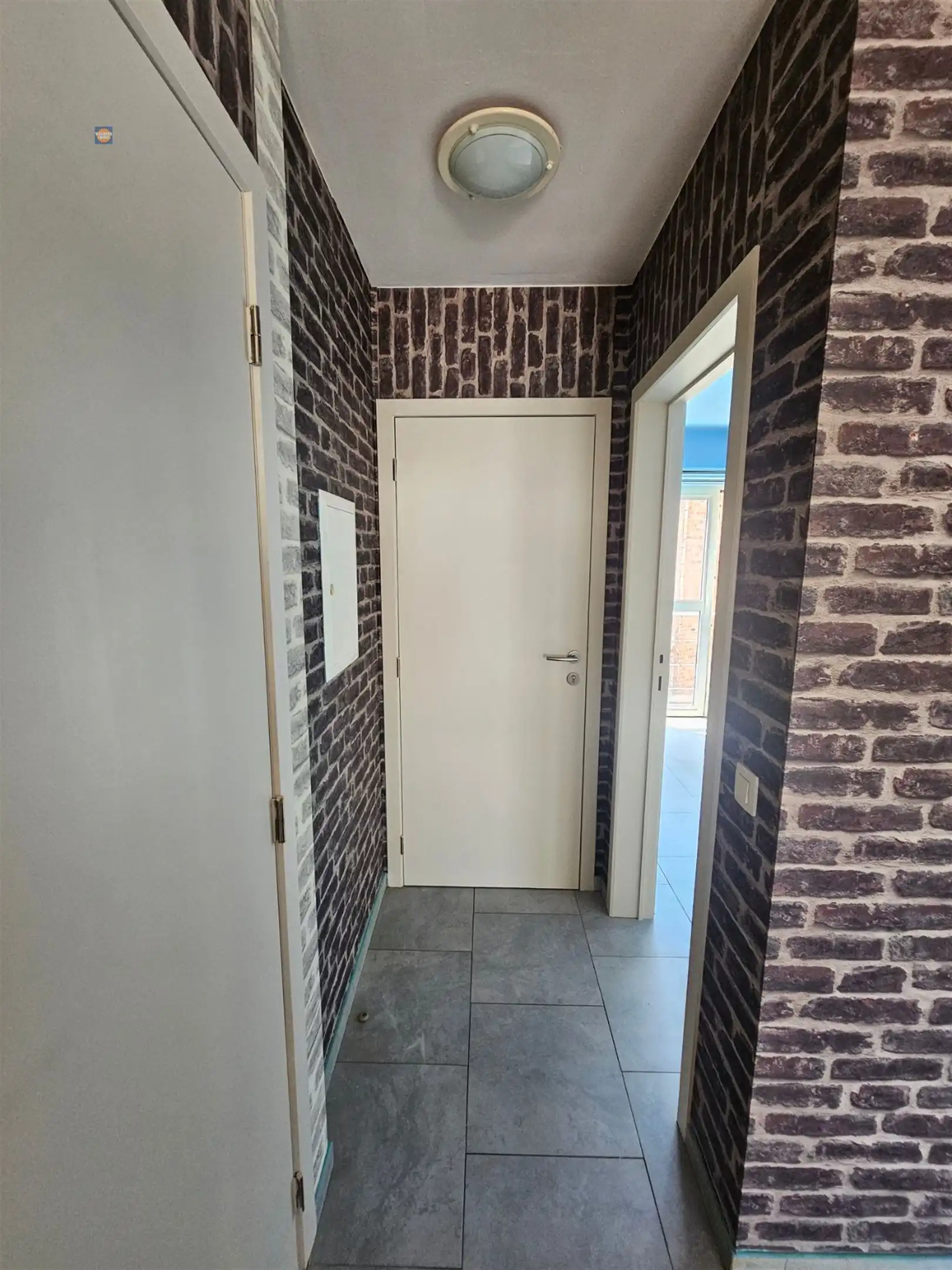 Instapklaar 1-slaapkamerappartement met kelderberging in centrum Willebroek foto 5