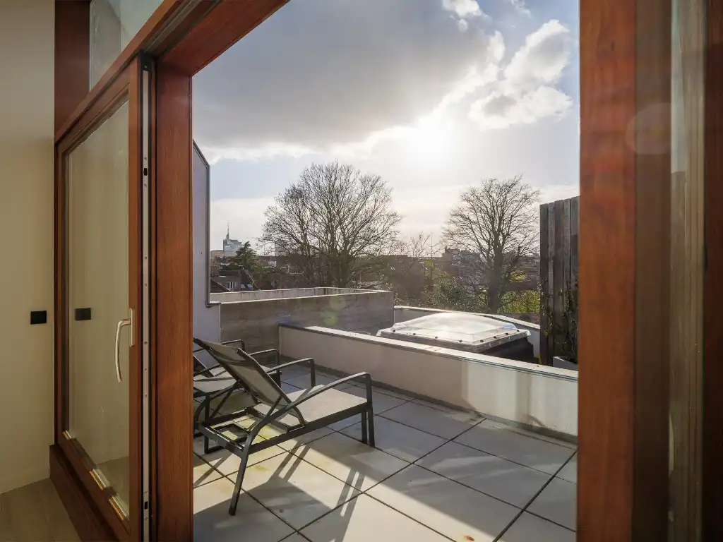 Architecturaal 3-­slaapkamerappartement met twee terrassen in het centrum van Gent. foto 3