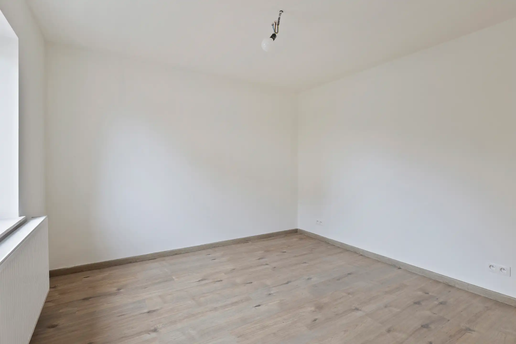 Volledig gerenoveerd gelijkvloers appartement met terras foto 8