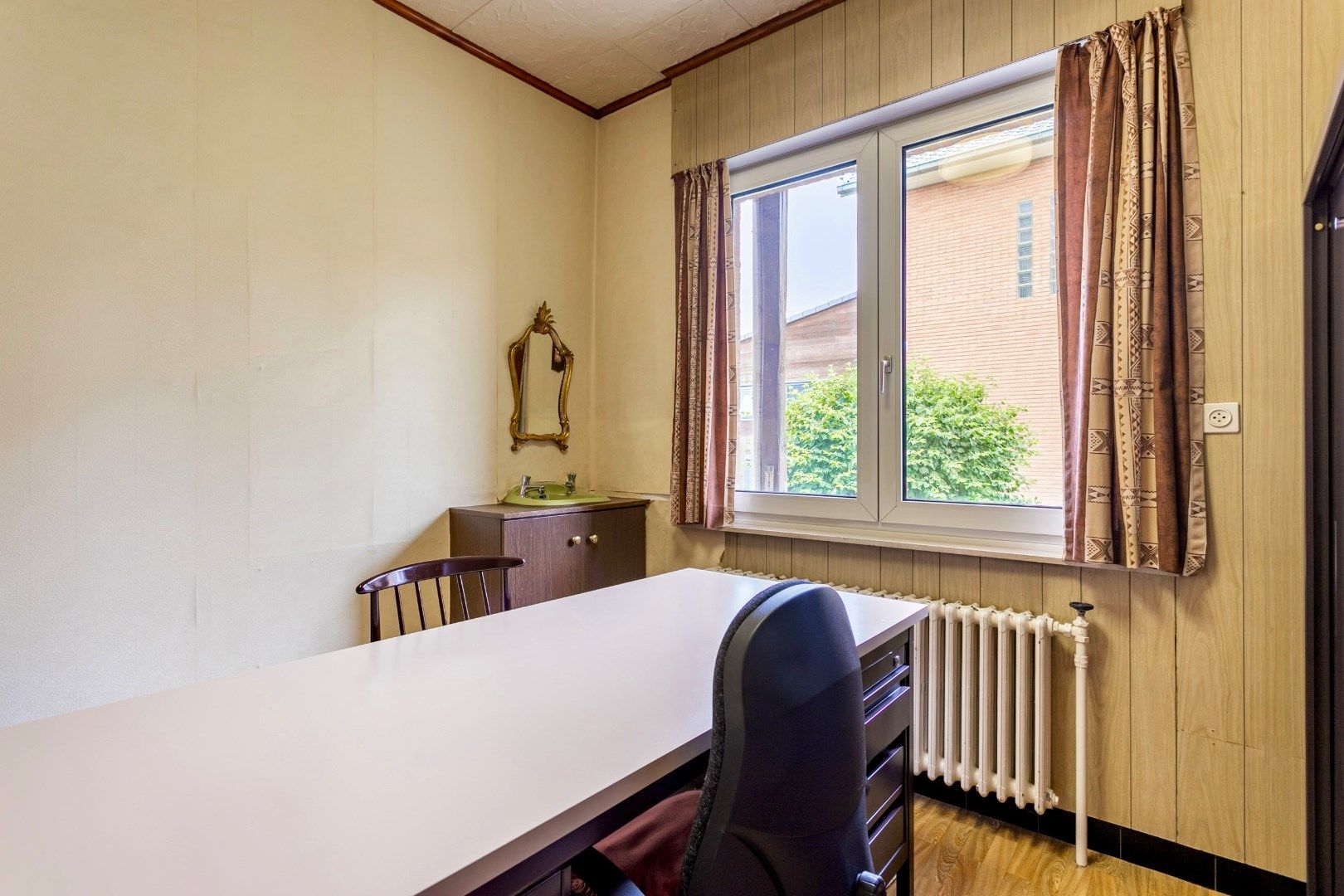 Woning met 2 (mogelijk 3) slpk. , tuin en inpandige garage foto 6