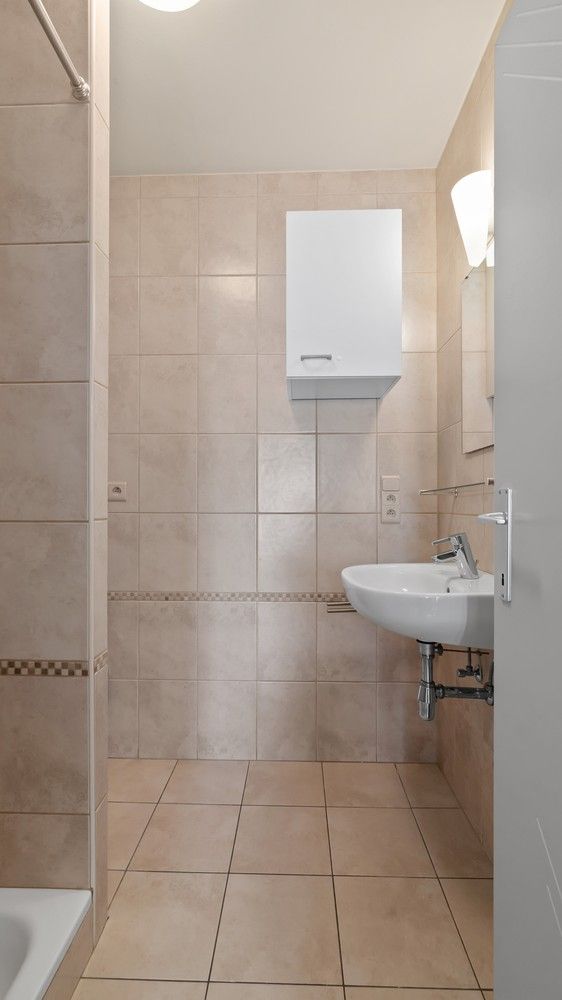 Instapklaar appartement met 1 ruime slaapkamer en kinderkamer in hartje Sint-Truiden foto 11