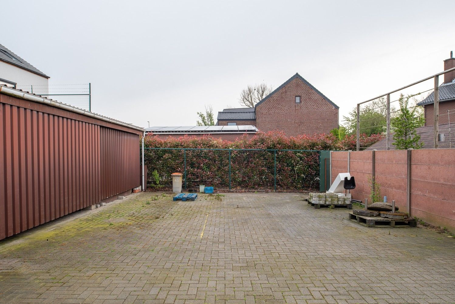 Handelshuis met magazijn en achterliggende tuin! foto 4