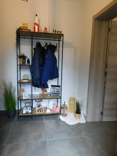 Rustig gelegen gelijkvloers appartement met tuin en carport foto 2