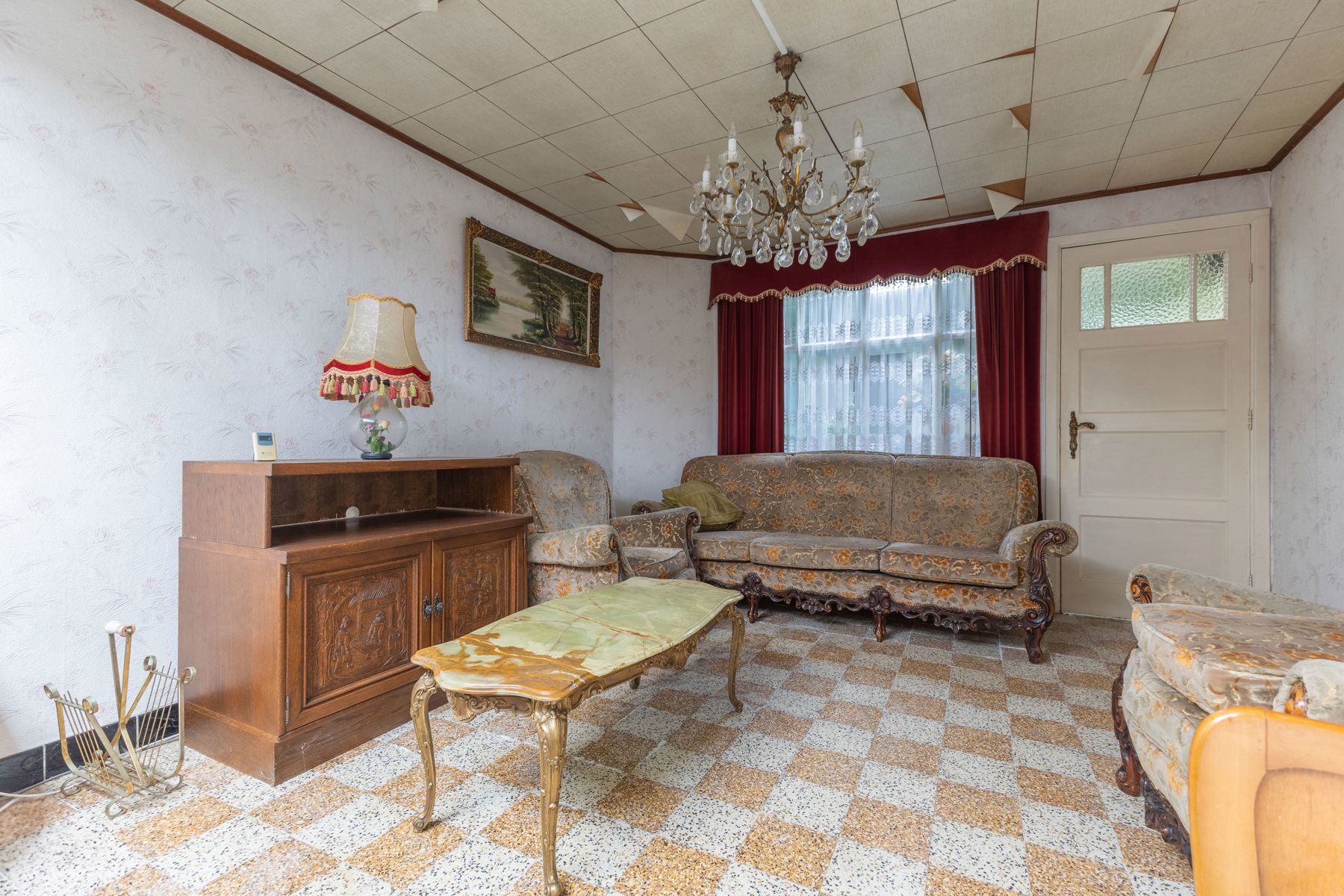 Te renoveren woning met tuin en garage foto 5