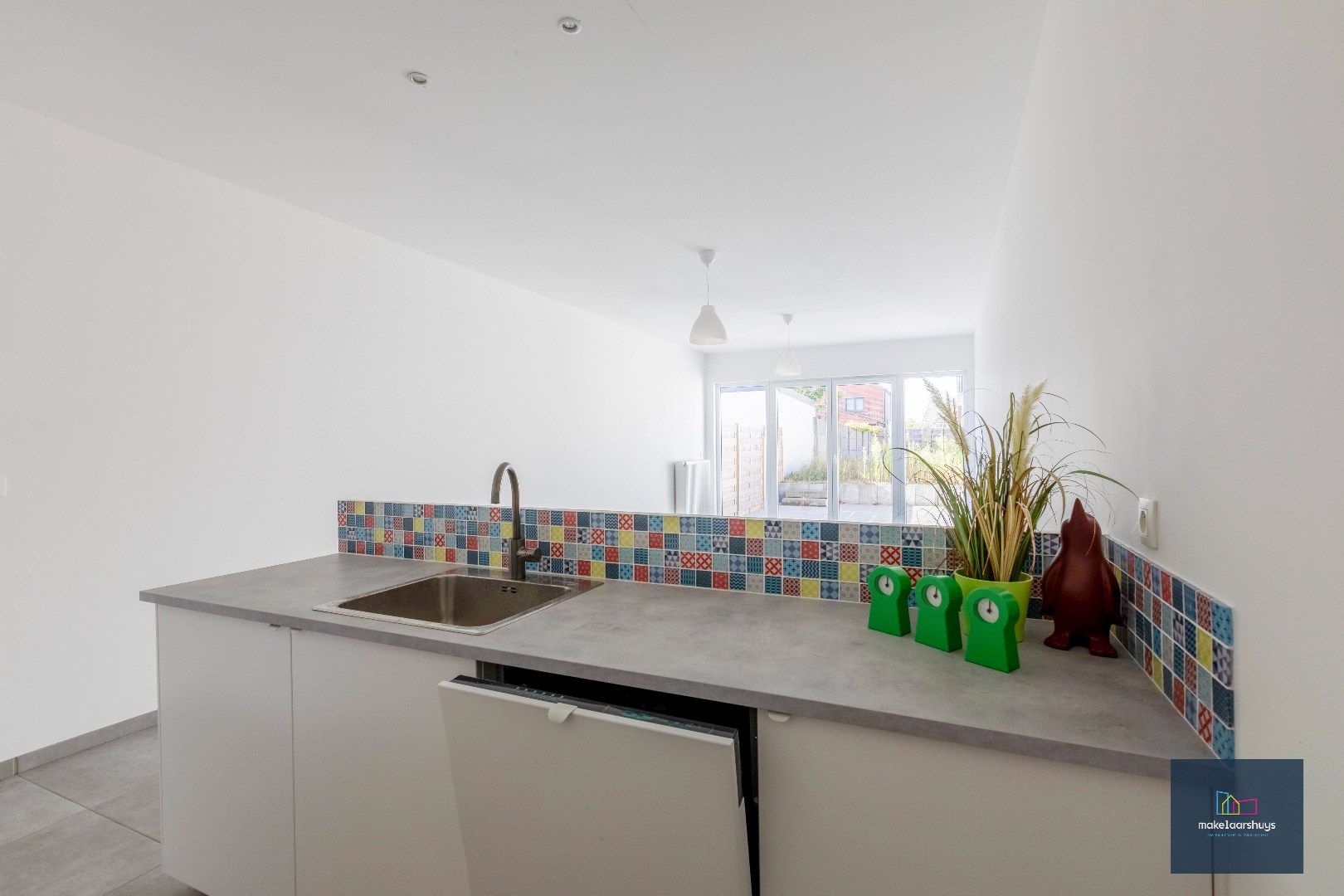 Instapklare energiezuinige woning met 3slpk tuin en staanplaats foto 8