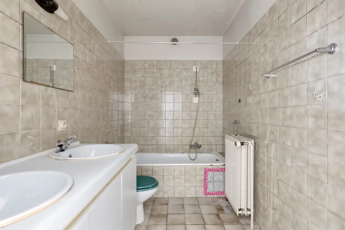 Functioneel en zonnig te renoveren appartement met drie slaapkamers en groot terras foto 12