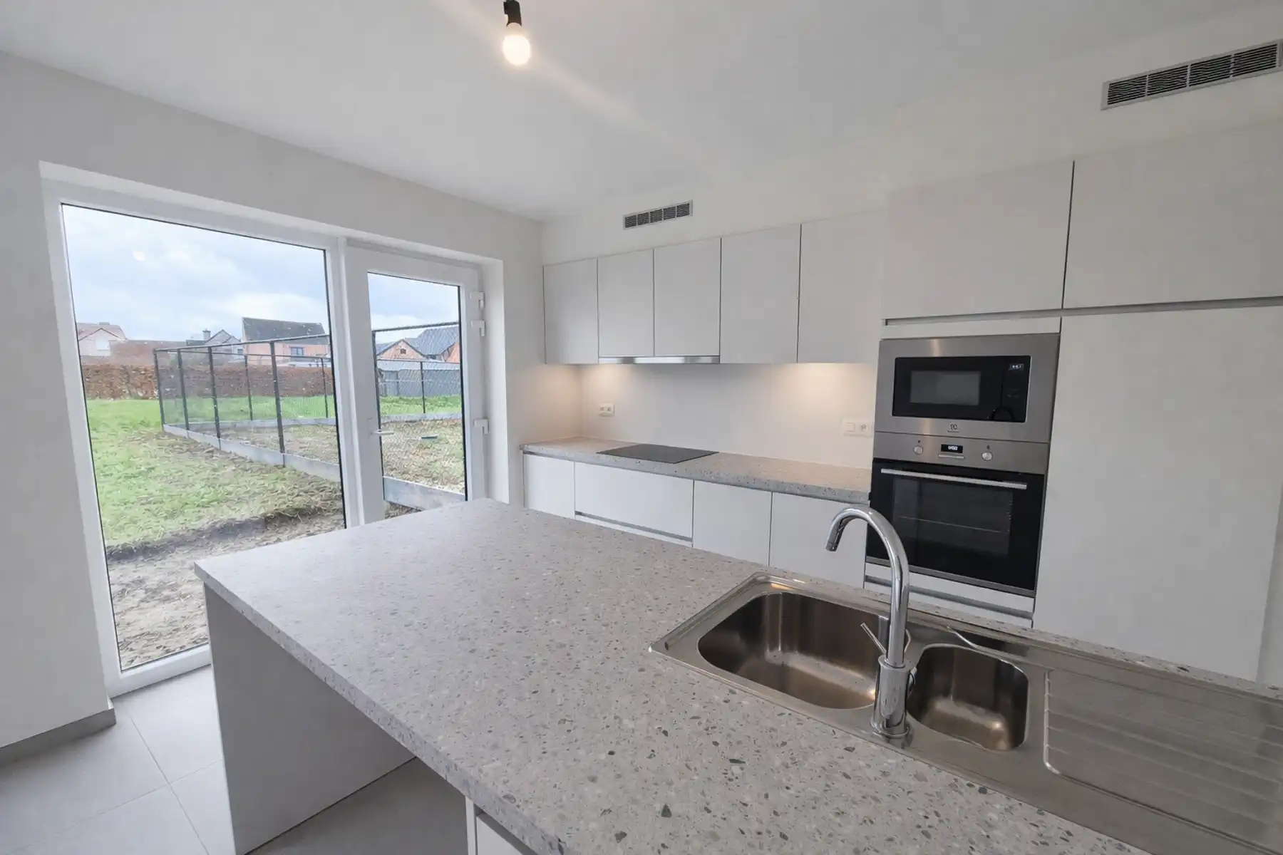 Gesloten bebouwing op de rand van Opwijk en Merchtem foto 7