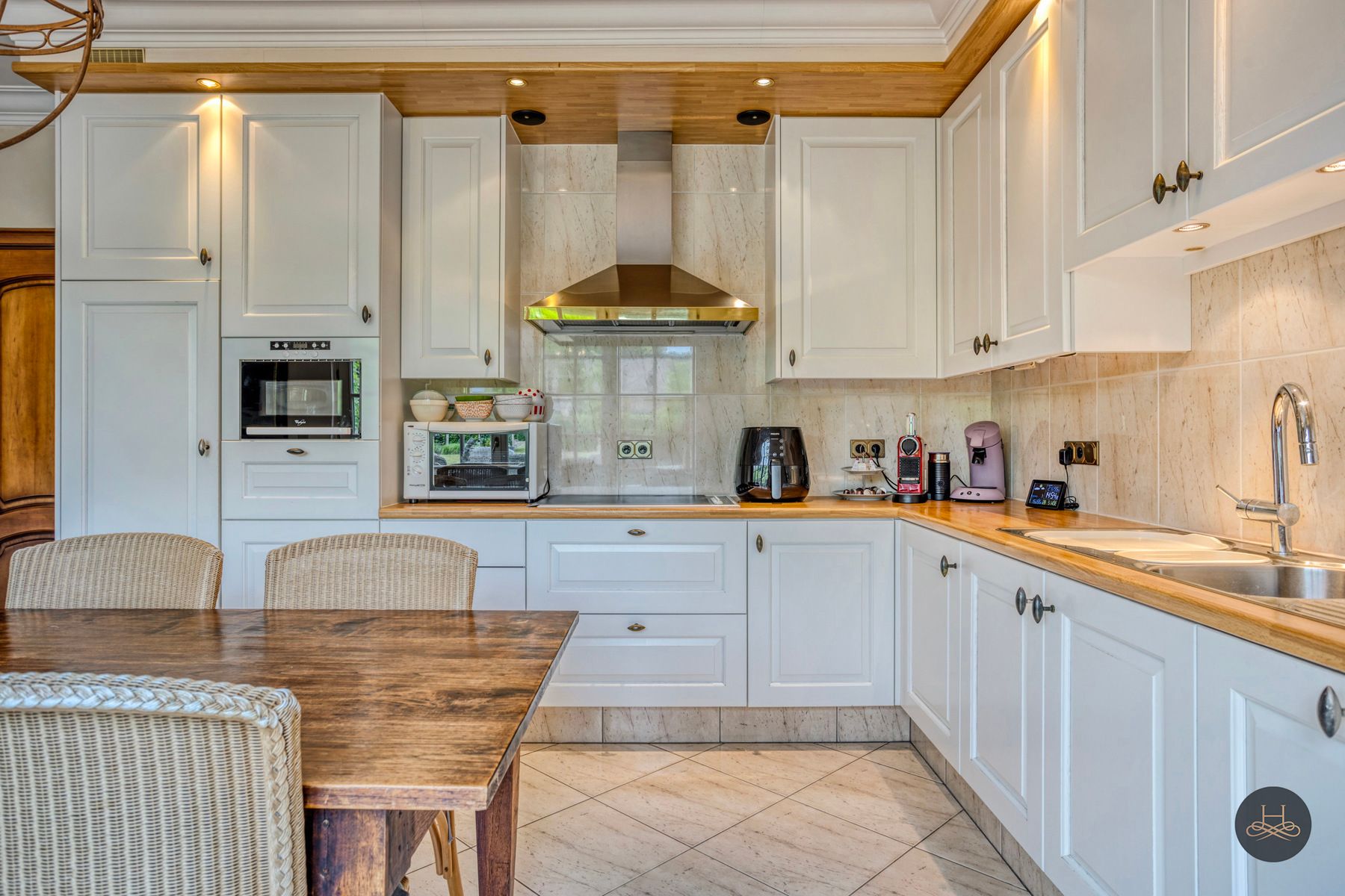 Stijlvolle woning met zorgvuldig aangelegde tuin foto 14