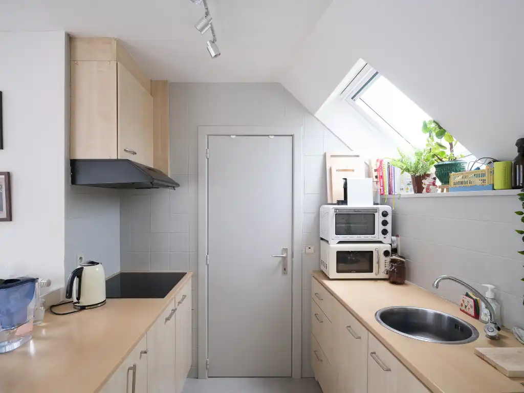 Opbrengsteigendom bestaande uit verschillende studio's en éénslaapkamer­appartementen in het centrum van Gent. foto 14
