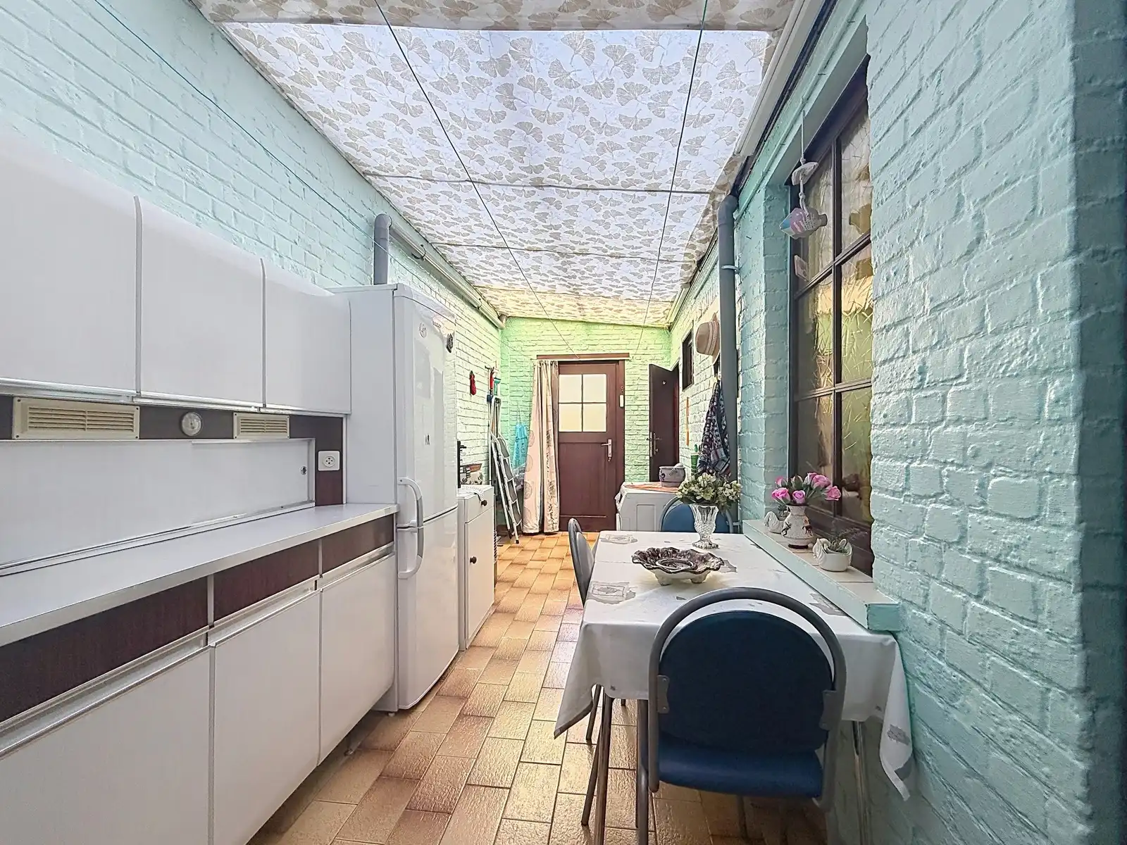 Gezellige stadswoning met 2 SLPK én zonnige tuin! foto 12