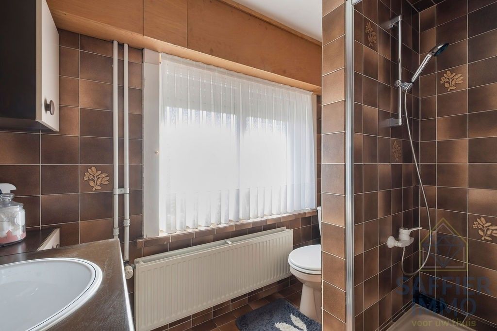 Ruime woning zonder renovatieplicht in de Seizoenswijk te Kuurne foto 28