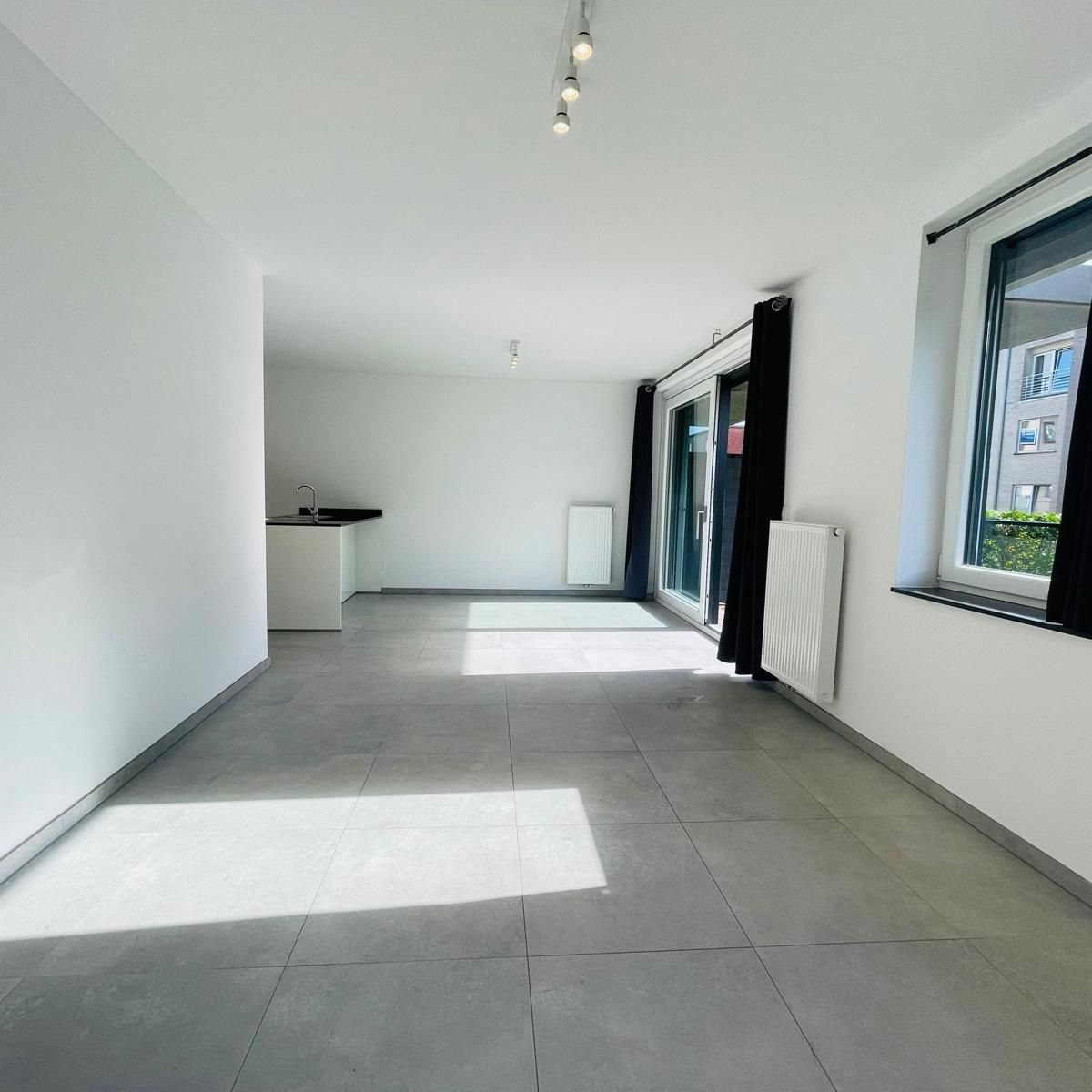 Gelijkvloers 2 slpk-appartement met tuintje foto 5