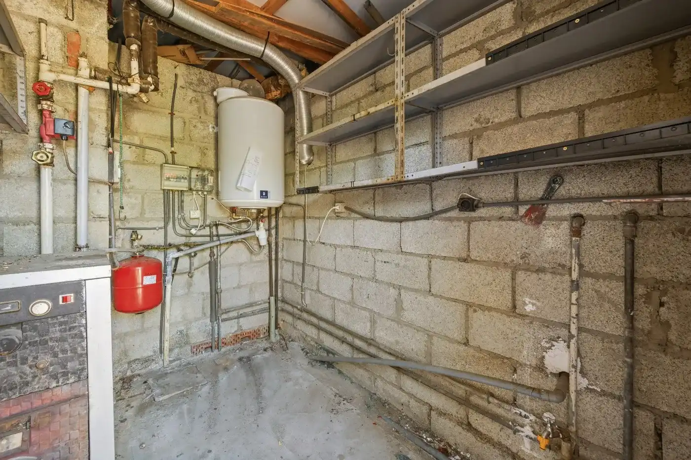 Te renoveren rijwoning in Attenhoven met tuin, garage en 3 slaapkamers foto 21